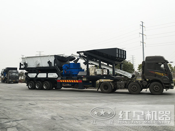 以配備制砂機(jī)為核心設(shè)備的河卵石車載流動(dòng)打石機(jī)